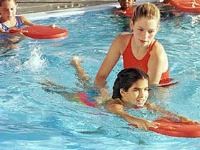 Instructor Giving Swim Lessons